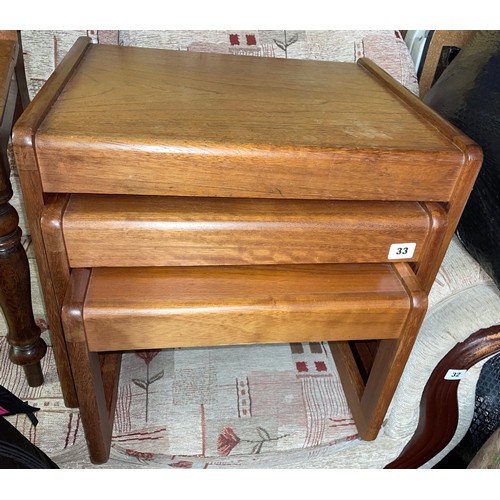 33 - 1970S TEAK NEST OF THREE TABLES