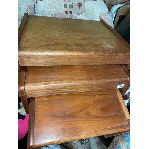 33 - 1970S TEAK NEST OF THREE TABLES