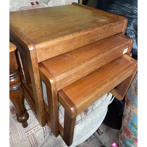 33 - 1970S TEAK NEST OF THREE TABLES