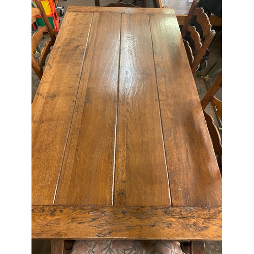 146 - REPRODUCTION 17TH CENTURY STYLE OAK DRAWER LEAF REFECTORY TABLE AND SIX WAVY LADDERBACK CHAIRS