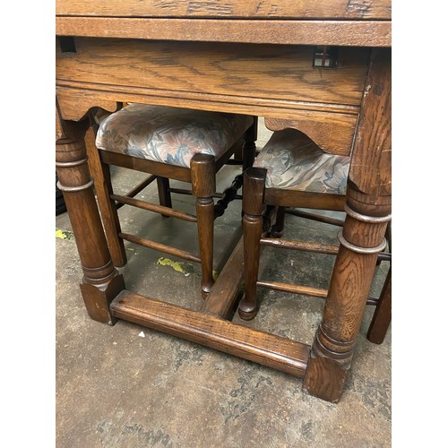 146 - REPRODUCTION 17TH CENTURY STYLE OAK DRAWER LEAF REFECTORY TABLE AND SIX WAVY LADDERBACK CHAIRS