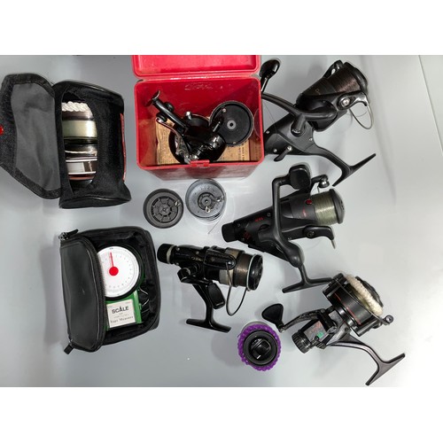 324 - SELECTION OF FIXED SPOOL FISHING REELS AND SPARE SPOOLS