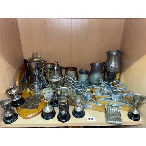 245 - SHELF OF ELECTRO PLATED TROPHIES, TANKARDS, AND ROWING RELATED AWARDS