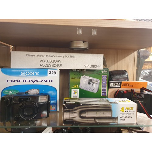 329 - SONY HANDYCAM, FOUR PACK VIDEO CASSETTES, PENTAX AND FUJI CAMERAS, AND OLYMPUS MULTI ZOOM CAMERA