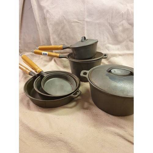 339 - SET OF CAST IRON SAUCEPANS AND SKILLETS