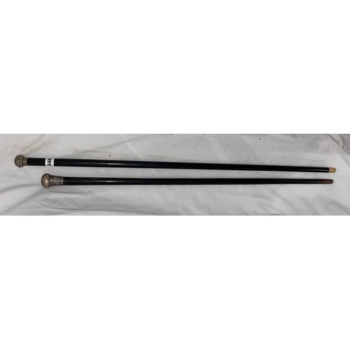 548 - TWO SILVER POMMEL TOPPED WALKING CANES