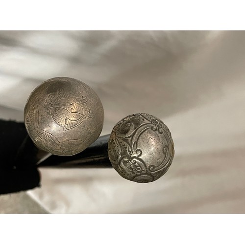 548 - TWO SILVER POMMEL TOPPED WALKING CANES