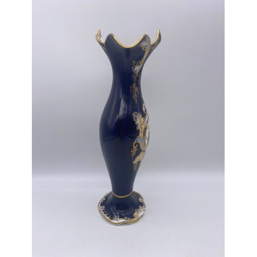 488 - 19TH CENTURY COALPORT STYLE BLEU DE ROI GILDED FLARED VASE WITH A PAINTED PANEL OF A RUIN IN A LANDS... 