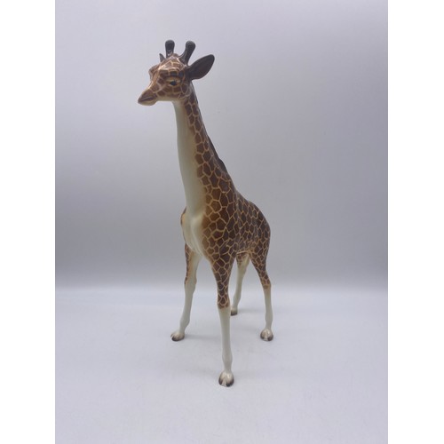 489 - BESWICK MODEL OF A GLOSS GIRAFFE