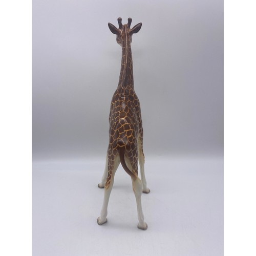 489 - BESWICK MODEL OF A GLOSS GIRAFFE