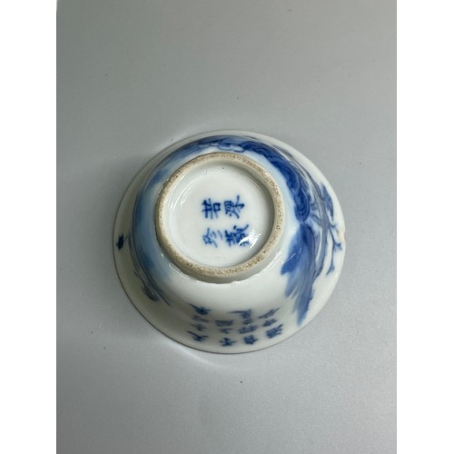 529 - MINIATURE CHINESE BOWL BLUE AND WHITE DECORATED WITH FIGURE IN A BOAT IN LANDSCAPE FOUR CHARACTER MA... 