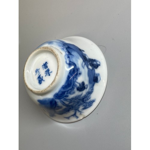 529 - MINIATURE CHINESE BOWL BLUE AND WHITE DECORATED WITH FIGURE IN A BOAT IN LANDSCAPE FOUR CHARACTER MA... 