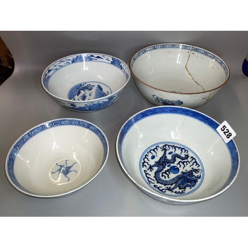 528 - TWO 19TH CENTURY CHINESE BLUE AND WHITE BOWLS ONE DECORATED WITH DRAGONS CHASING THE FLAMING PEARL, ... 