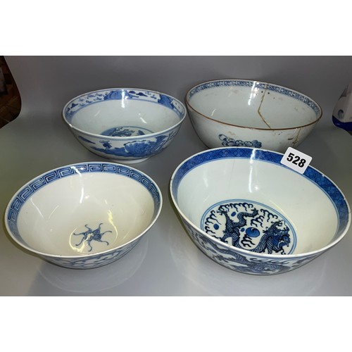 528 - TWO 19TH CENTURY CHINESE BLUE AND WHITE BOWLS ONE DECORATED WITH DRAGONS CHASING THE FLAMING PEARL, ... 