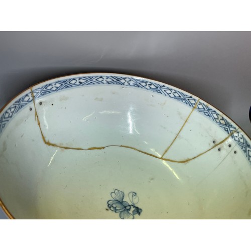 528 - TWO 19TH CENTURY CHINESE BLUE AND WHITE BOWLS ONE DECORATED WITH DRAGONS CHASING THE FLAMING PEARL, ... 