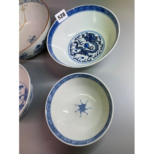 528 - TWO 19TH CENTURY CHINESE BLUE AND WHITE BOWLS ONE DECORATED WITH DRAGONS CHASING THE FLAMING PEARL, ... 