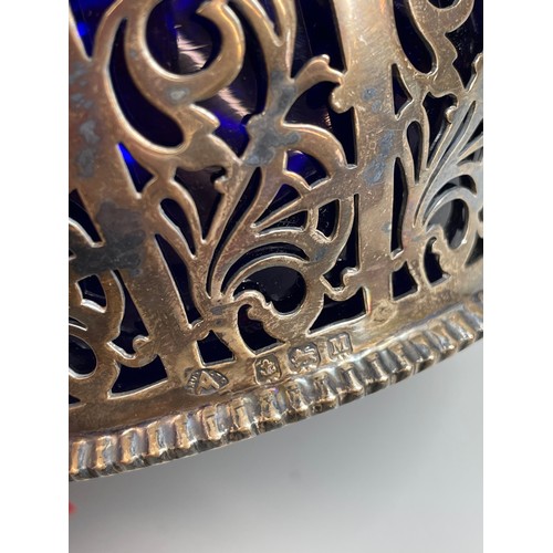 524 - BIRMINGHAM SILVER FILIGREE BASKET AND COVER WITH BLUE GLASS LINER (H: 10cm D: 11cm)