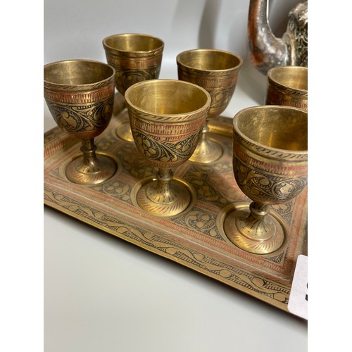 498 - EASTERN COPPER REPOUSSE KETTLE AND ENAMEL BRASS METALWARE GOBLETS ON TRAY