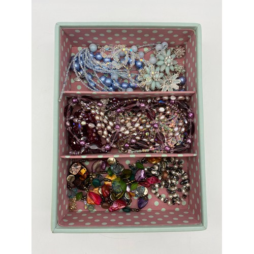 464 - GREEN STACK BOX OF VARIOUS COSTUME JEWELLERY SETS AND EARRINGS AND NECKLACE SETS, BANGLES, BEADS, ST... 