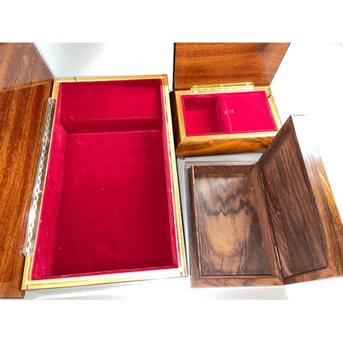 386 - TWO SORRENTO MARQUETRY STYLE MUSICAL BOXES AND A BRASS INLAID HARDWOOD BOX