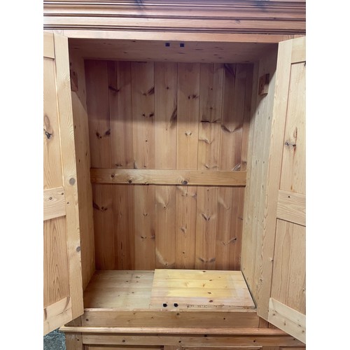 94 - PINE THREE DOOR WARDROBE WITH THREE DRAWERS