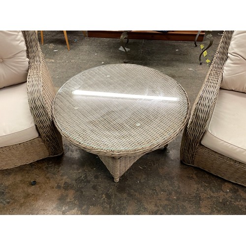 120 - PAIR OF POLYMER-WEAVE OUTDOOR ARMCHAIRS AND GLASS TOPPED OCCASIONAL TABLE