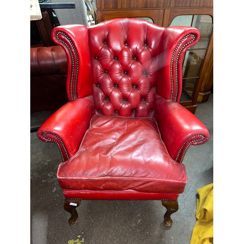 143 - RED LEATHER BUTTON BACK WING ARMCHAIR