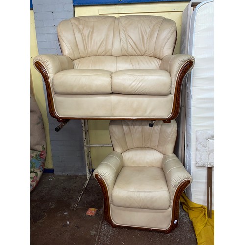 162 - TAN TWO SEATER LEATHER SOFA AND MATCHING ARMCHAIR