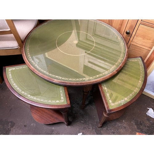 181 - MAHOGANY AND GREEN LEATHER TOPPED CIRCULAR COFFEE TABLE AND NEST OF FOUR COMPACT TABLES