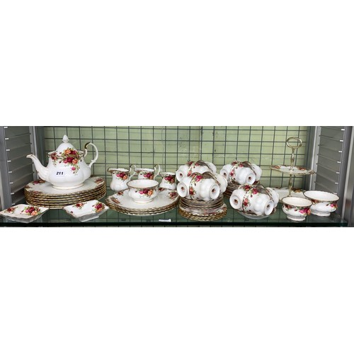 211 - SHELF OF ROYAL ALBERT OLD COUNTRY ROSES DINNER AND TEA SERVICE INC. PLATES, CAKE STAND AND TEAPOT