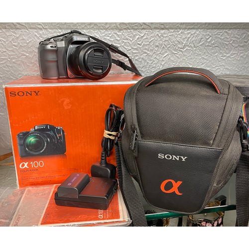 214 - BOXED SONY DSLR-A100K CAMERA AND ZOOM LENS KIT