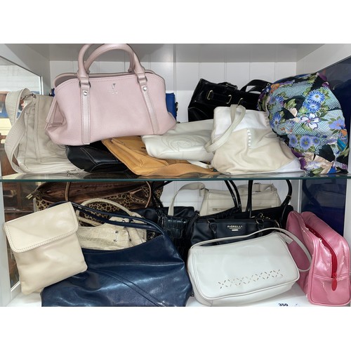 350 - TWO SHELVES OF LADIES HANDBAGS INCLUDING FIORELLI