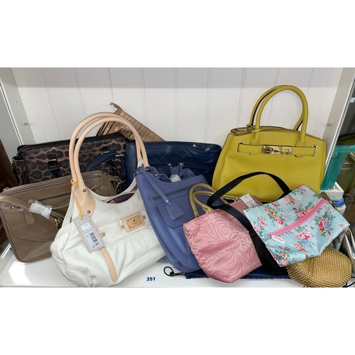 351 - SHELF OF BRAND NEW WITH TAGS LADIES HANDBAGS AND CLUTCHES INCLUDING RADLEY, HOTTER, CATH KIDSTON, AN... 