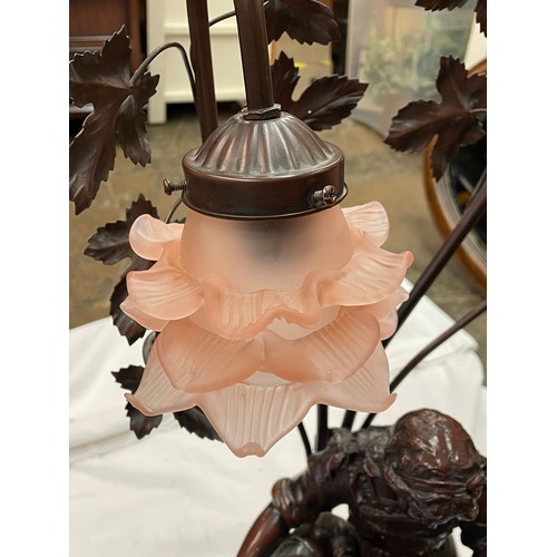 473 - REPRODUCTION FRENCH STYLE RESIN FIGURAL TWIN LAMP WITH FROSTED GLASS FLOWER SHADES (WITH SPARE SHADE... 