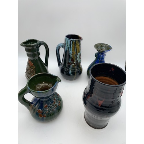 491 - ELTON POTTERY JUGS AND TAPERED VASES IN MUTED DRIP GLAZE COLOURS (5)