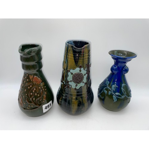 491 - ELTON POTTERY JUGS AND TAPERED VASES IN MUTED DRIP GLAZE COLOURS (5)