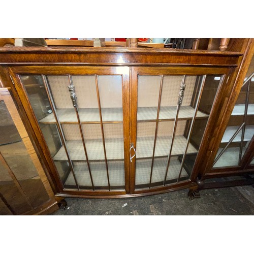 68 - OAK BOW FRONTED GLAZED CABINET ON BALL AND CLAW FEET