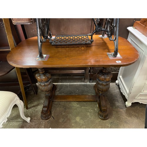 86 - OAK CARVED CUP AND COVER STRETCHER SMALL TABLE