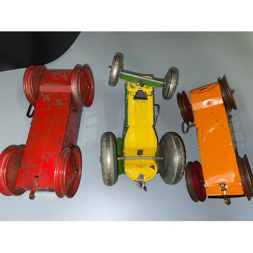 376 - METTOY PLAYTHINGS C1950 GREEN TIN PLATE CLOCKWORK TRACTOR WITH KEY AND TWO LITHOGRAPHED CLOCKWORK C1... 