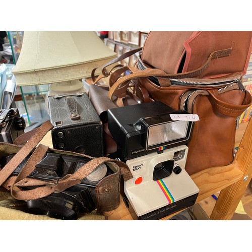 390 - SHELF OF VINTAGE BOX CAMERAS, MIRANDA AND PHOTOMATIC FLASH METERS, POLAROID INSTAMATIC CAMERA AND RE... 