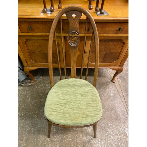 31 - ERCOL EXTENDING DINING TABLE WITH FOUR SWAN CAMEO BACK CHAIRS