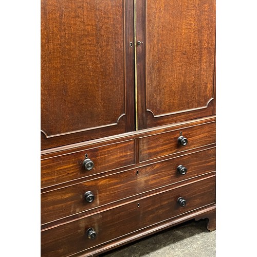 85 - GEORGE III MAHOGANY LINEN PRESS CUPBOARD WITH DENTIL MOULDED CORNICE (FOOT AS FOUND)