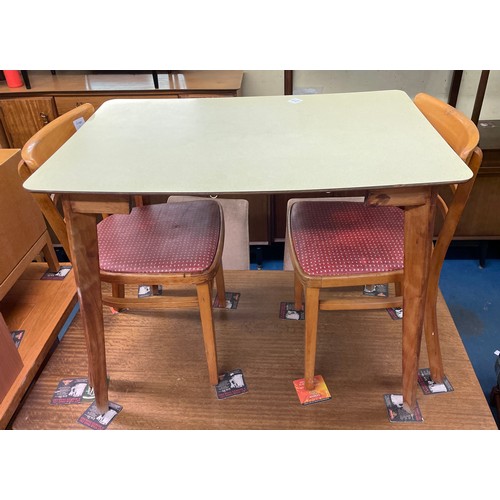 9 - VINTAGE 1950S YELLOW FORMICA TOPPED KITCHEN TABLE AND TWO CHAIRS