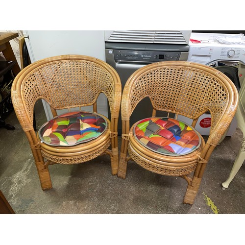 32 - PAIR OF BAMBOO AND RATTAN BASKET BACKED ARMCHAIRS