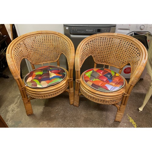 32 - PAIR OF BAMBOO AND RATTAN BASKET BACKED ARMCHAIRS