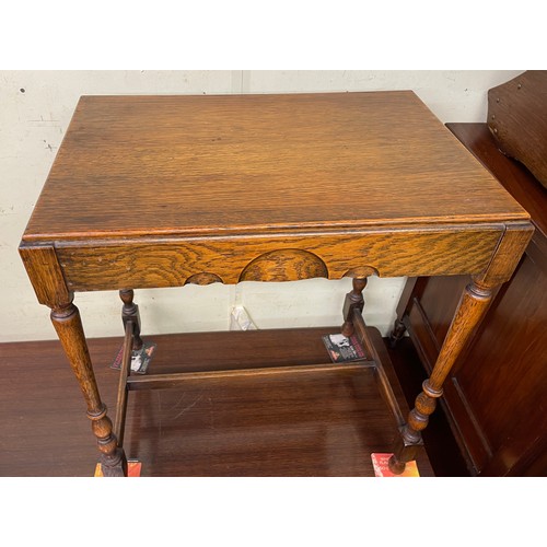 16 - OAK OCCASIONAL TABLE ON SLENDER TURNED STRETCHER LEGS