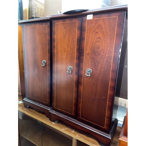 61 - MAHOGANY TWO DOOR CD STORAGE CABINET AND MATCHING SINGLE DOOR CABINET OF CDS