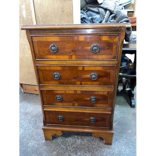 135 - REPRODUCTION YEW CROSS BANDED SMALL FOUR DRAWER CHEST