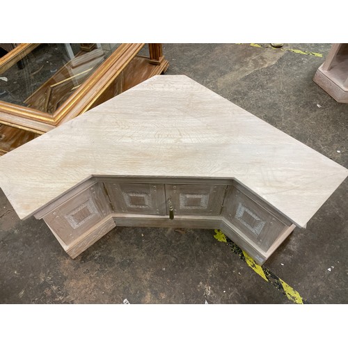 30 - TWO LIMED OAK INVERTED BREAK FRONT MEDIA CHESTS