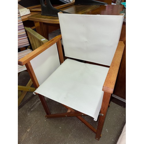 119 - TWO DIRECTORS STYLE FOLDING CHAIRS